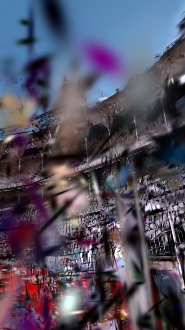 A render of the bullring splat: seats visible under coloured streaks and floating shards.